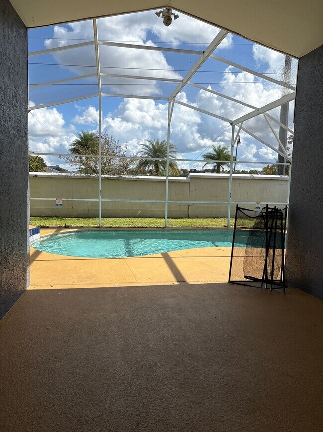 Building Photo - Spacious 4-Bedroom Pool Home in Indian Creek – Kissimmee, FL