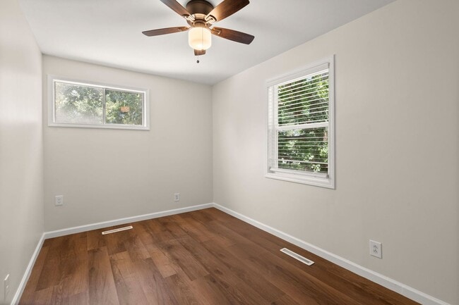 Building Photo - Spacious Split-Level Living with Dual Fireplaces & Expansive Deck