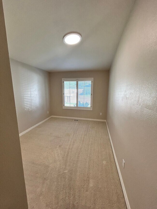 Building Photo - Spacious Duplex with 3-Car Garage & Private Patio!