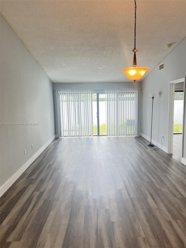 Building Photo - 10155 Boca Bend E
