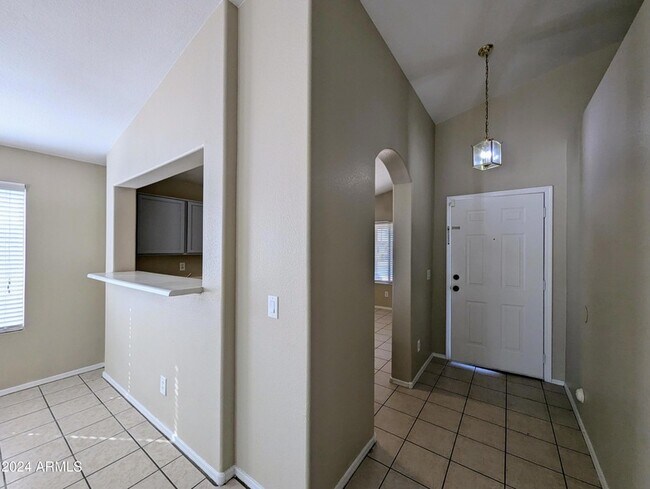 Building Photo - 7059 W Gardenia Ave