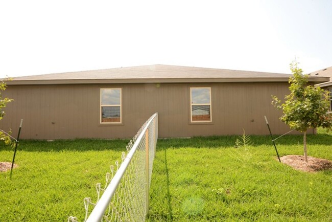 Building Photo - 6111 Amelia Earhart Blvd