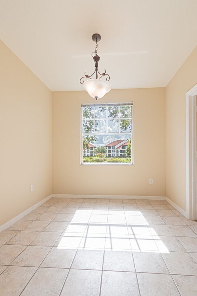 Building Photo - Ground-Level Comfort in North Naples – 2BR Condo in Fairway Preserve at Olde Cypress