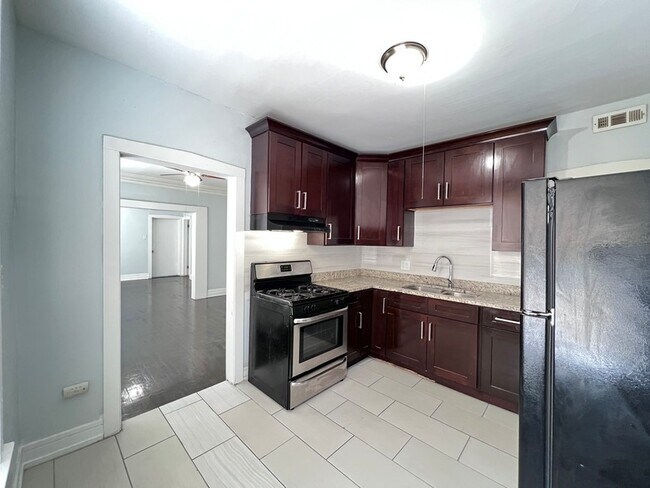 Building Photo - 8856 S Lowe Ave