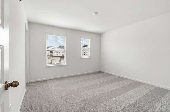 Building Photo - Spacious 3-Bed Townhouse w/ Two Car Garage