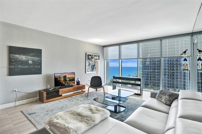 Building Photo - 10275 Collins Ave