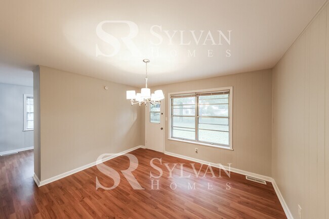 Building Photo - Turn the key. Enter. Smile. Repeat every day!