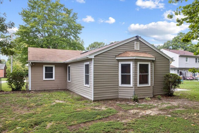 Building Photo - Updated Four bedroom, two full bathroom home