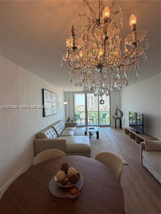 Building Photo - 19370 Collins Ave