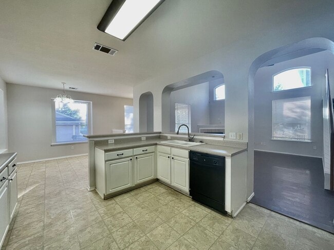 Building Photo - Spacious Home with Multiple Outdoor Living...