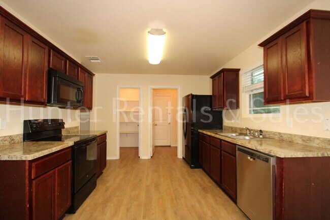 Building Photo - Beautiful 4-Bedroom, 2-Bath Home for Rent ...