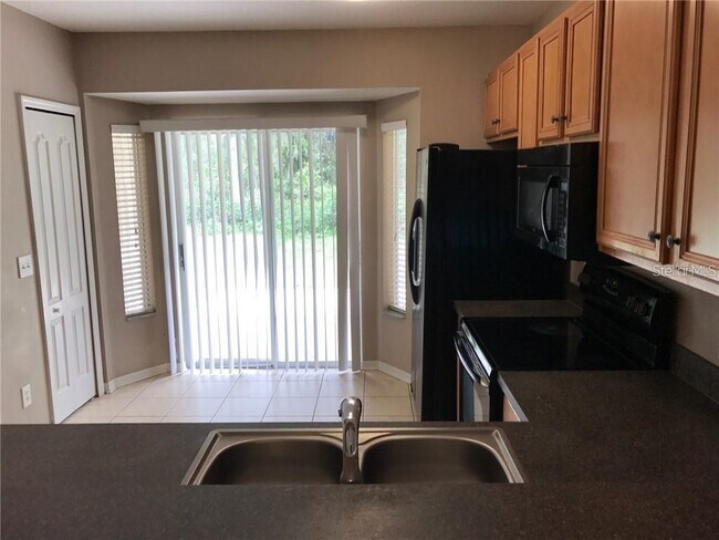 Building Photo - 15776 Fishhawk Falls Dr