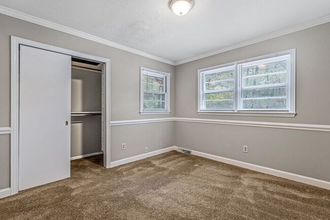 Building Photo - McLeansville - Minutes from Elon & Greensboro! Brick Duplex on a few Acres, Den, SS Appliances, F...