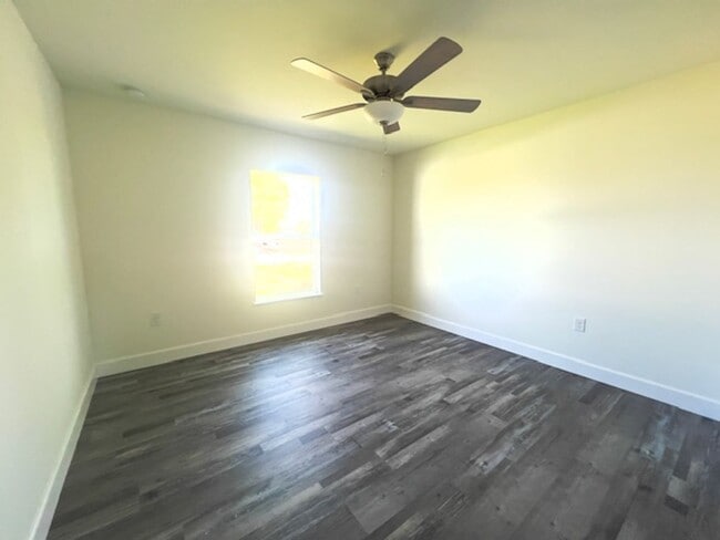 Building Photo - Available Now!! NW CAPE CORAL - 4 Bedrooms - 3 Bathrooms - 2 Car Garage