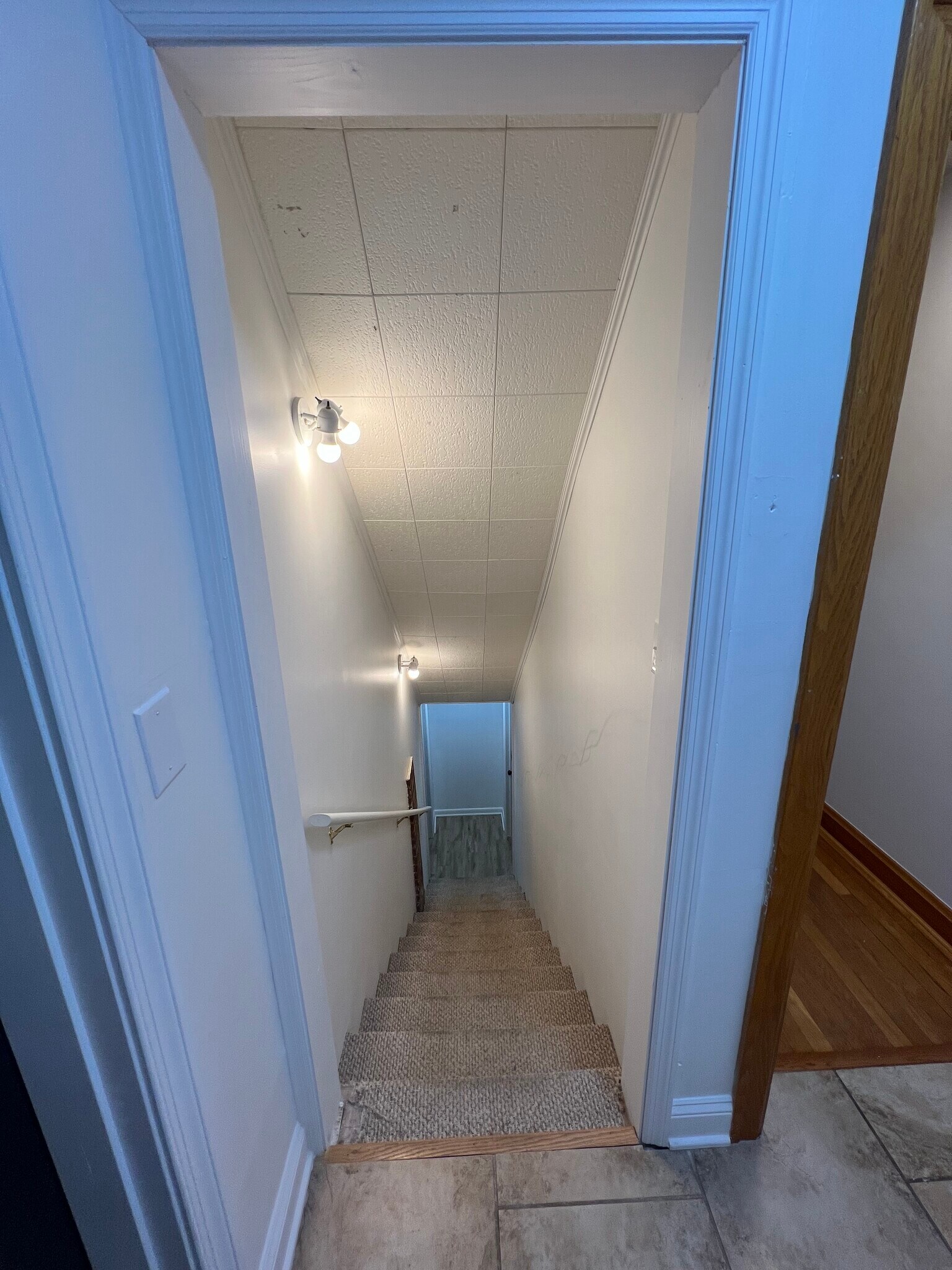 Stairs leading to available apartment - 116 Cumberland Ct