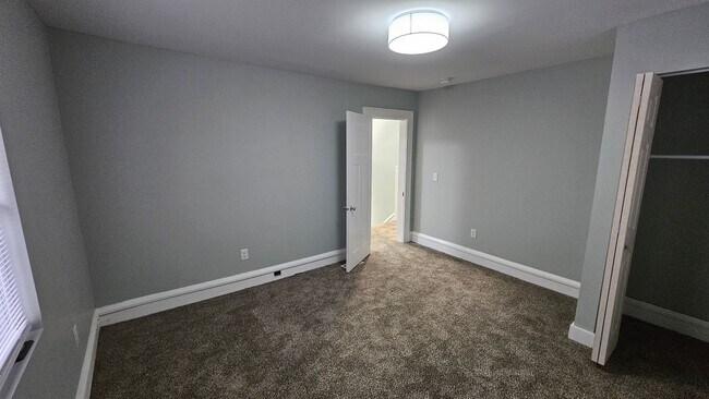 Building Photo - Stunning Renovation Ready for Your Finishing Touches!