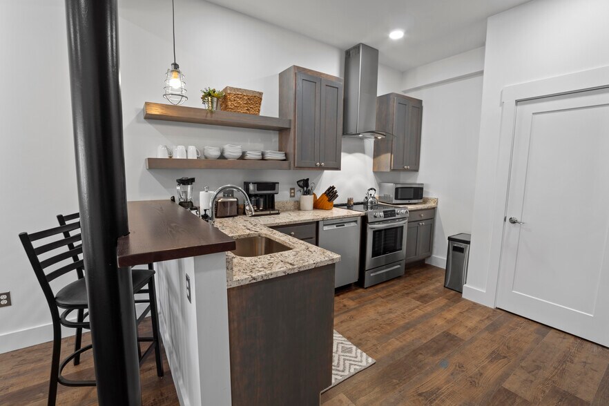 Kitchen - Pics are of a model. Actual unit may vary slightly. - 133 W Main St