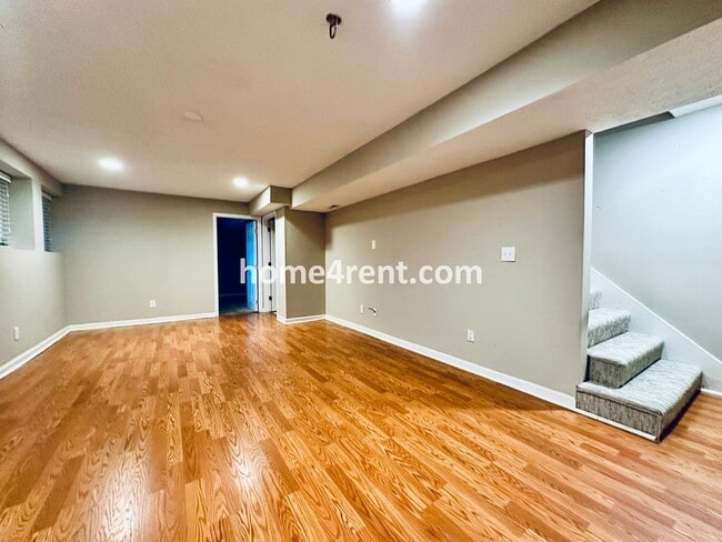 Building Photo - Updated Kitchen, Large Two Tiered Deck, Finished Basement in Blue Valley Schools!