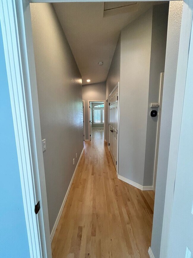 Building Photo - Spacious Duplex with 3-Car Garage & Private Patio!