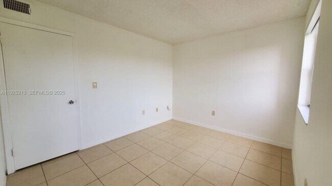 Building Photo - 8665 NW 6th Ln