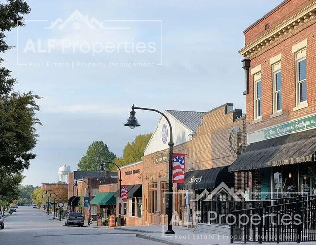 Building Photo - Luxury Downtown Wake Forest Living – Brand-New End Unit with Rooftop Terrace
