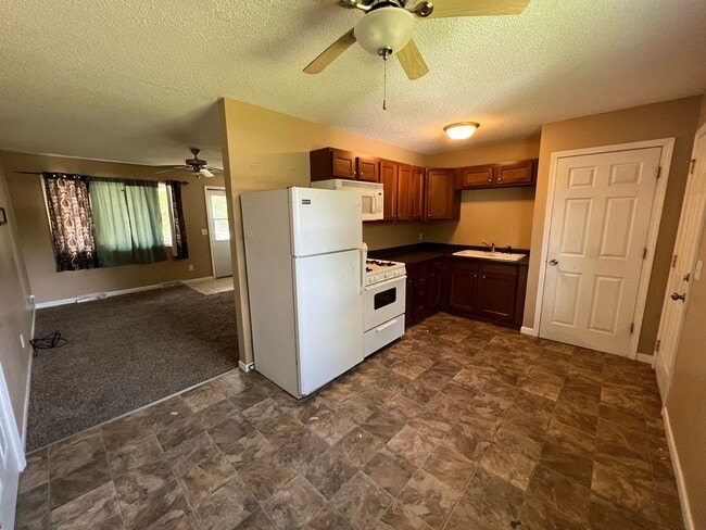 Building Photo - Spacious Home Coming Soon!