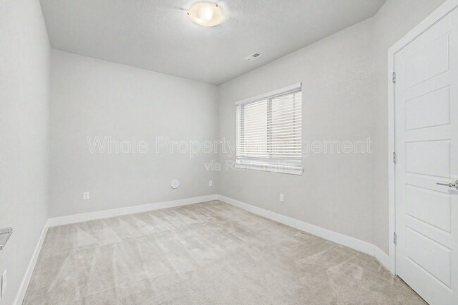 Building Photo - 9985 E 59th Ave