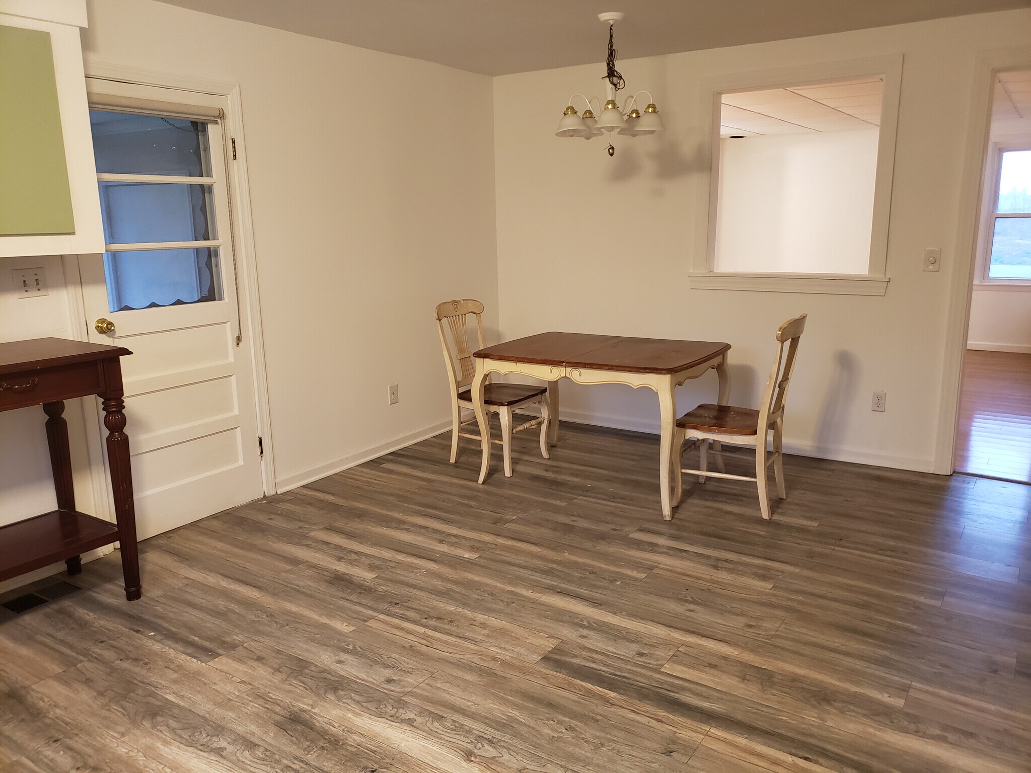 Plenty of room for a large dining table. Pass through makes for a more open feeling between living room and kitchen area. - 10106 Wingfield Rd