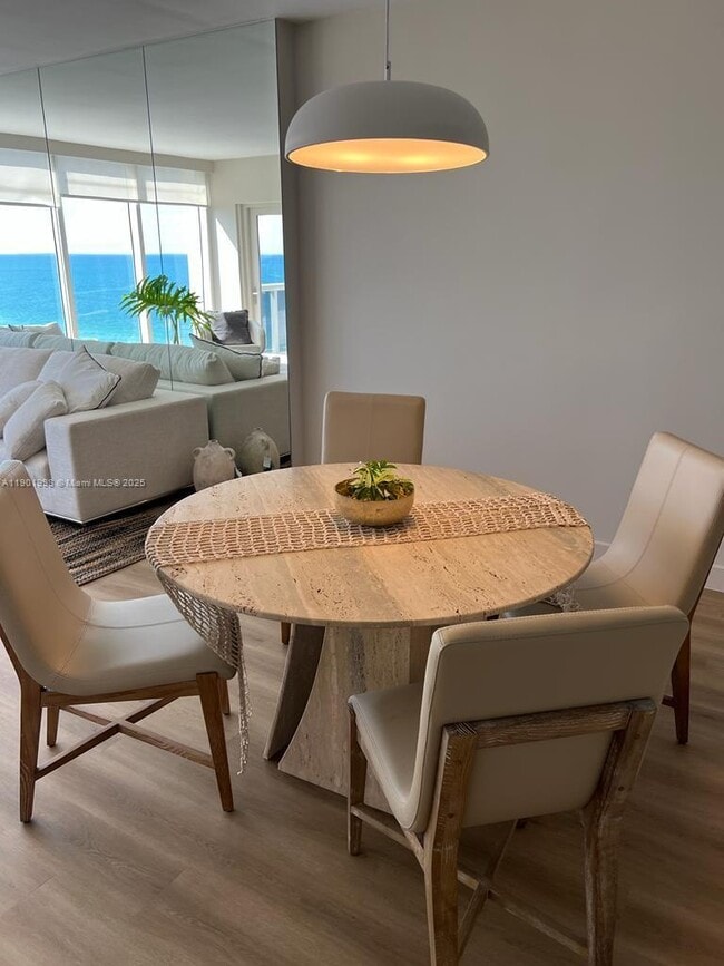 Building Photo - 10275 Collins Ave