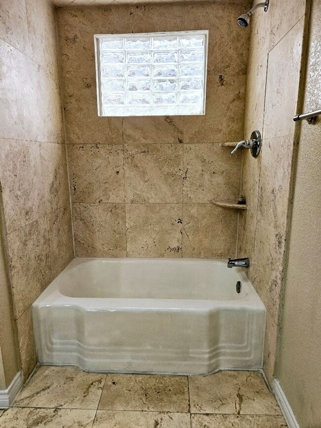 Building Photo - Mediterranean style condo within walking d...