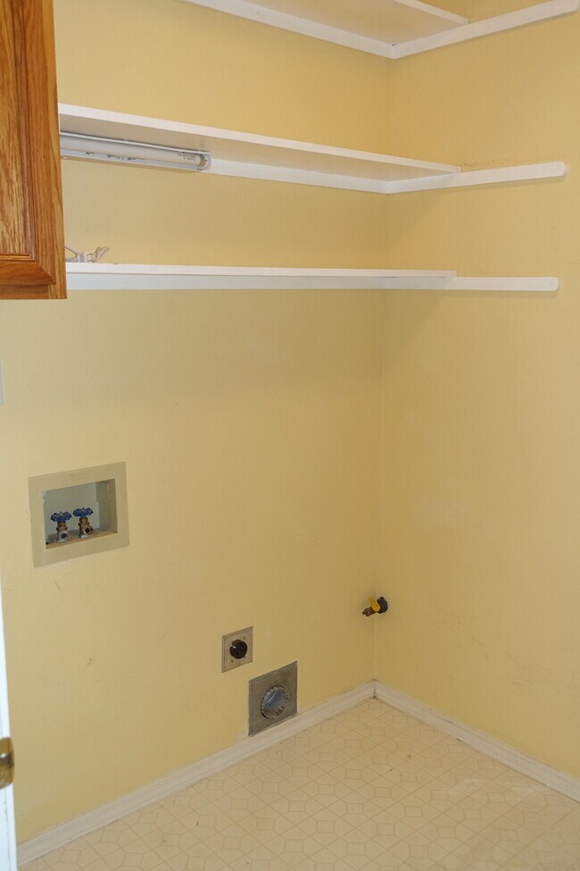 Building Photo - Three-Bedroom Two Bath Home