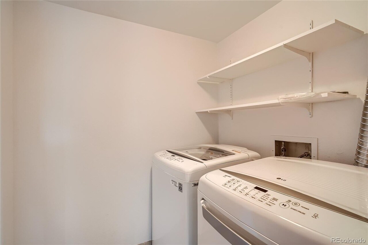 Laundry room with LG washer & dryer (2022) - 14282 E Tufts Pl