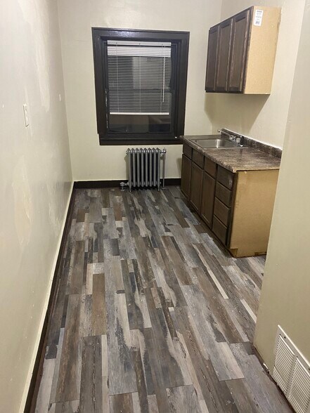 Building Photo - 7852 S Colfax Ave