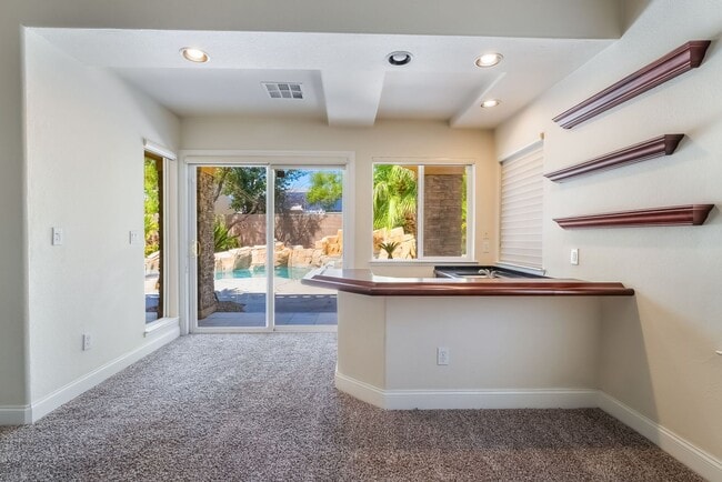 Building Photo - Beautiful Three Story, Five Bedroom Home with Lagoon Style Pool and Spa