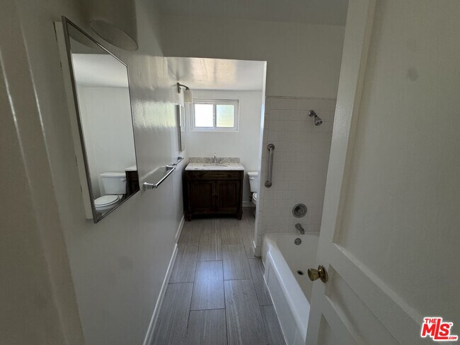 Building Photo - 6003 Bellflower Blvd