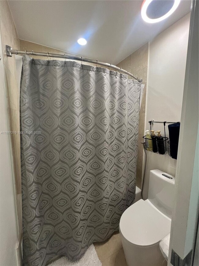 Building Photo - 6917 Collins Ave