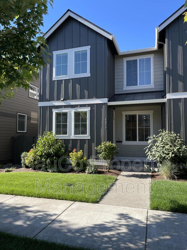 Building Photo - 6473 SE Genrosa St