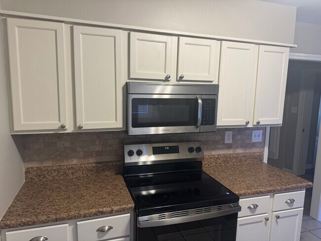 Building Photo - 7145 Claiborne Dr