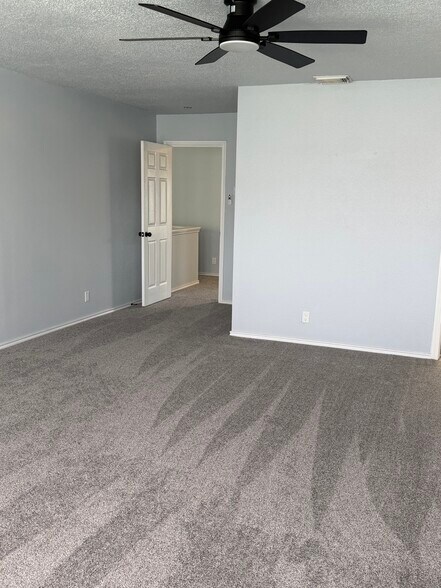 Master bedroom facing door - 9647 Orchid Mdws