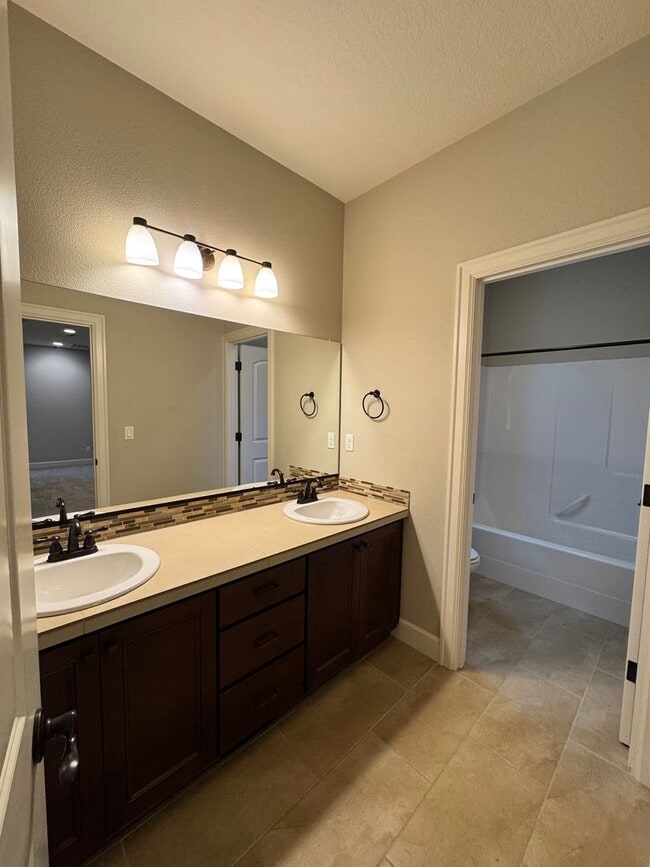 Building Photo - FOR RENT UNFURNISHED: Beautifully maintained 2015 Noyes-built home, 5 bed, 3 bath, 2 car garage w...