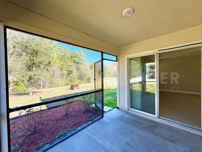 Building Photo - Room to Live, Space to Thrive! Stunning 6BR Home with Solar, Upgrades & Screened Lanai in Macclen...