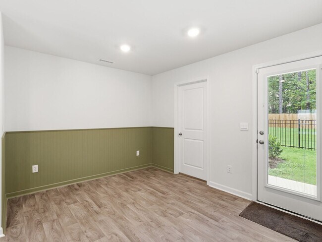 Building Photo - Newly Built 3BD, 2.5BA End Unit Raleigh Townhome with a Fenced Yard in a Prime Location
