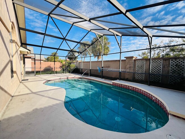 Building Photo - 2/2 POOL HOME with 2 Car Garage located in...