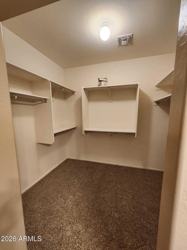 Building Photo - 7643 W Charter Oak Rd