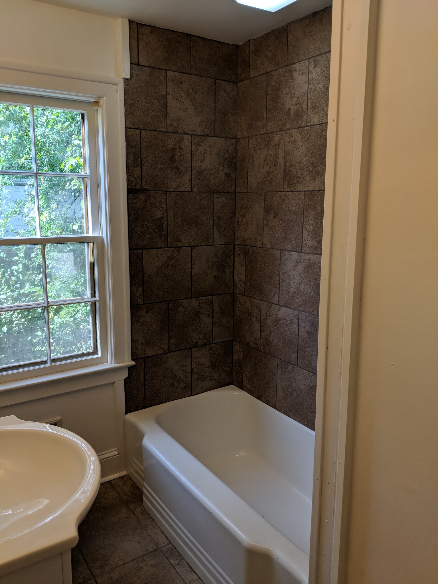 Brand new tile in bathroom. Shower and floors. - 1111 Watauga St