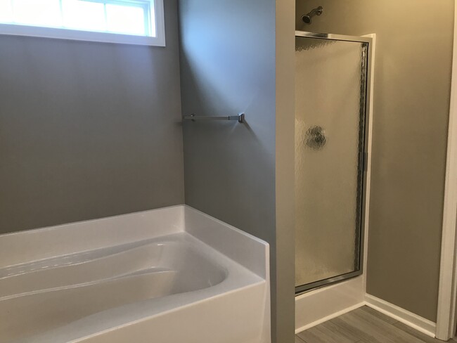 Master Bathroom with separate Soaking Tub and Shower - 1217 Copperstone Way