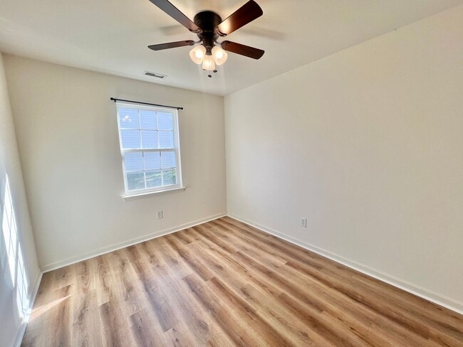 Building Photo - Charming 4BD, 2BA Fuquay-Varina Home with Large Backyard Near Interstates