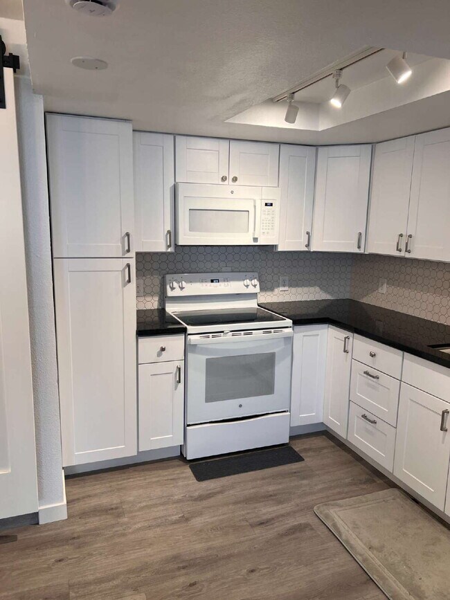Building Photo - Newly Renovated 1-Bedroom 1-Bath Condo in Thornton! 2-Balconies, 1-Reserved Parking Spot.