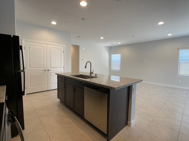 Building Photo - 4 BED 2 BATH 2 CAR GARAGE SINGLE STORY SINGLE FAMILY HOME w/ PAVED BACKYARD IN CADENCE COMMUNITY,...