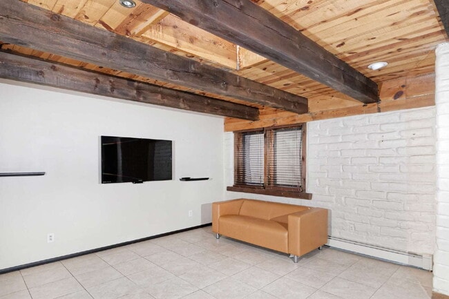 Building Photo - One-of-a-kind adobe brick home backing up ...